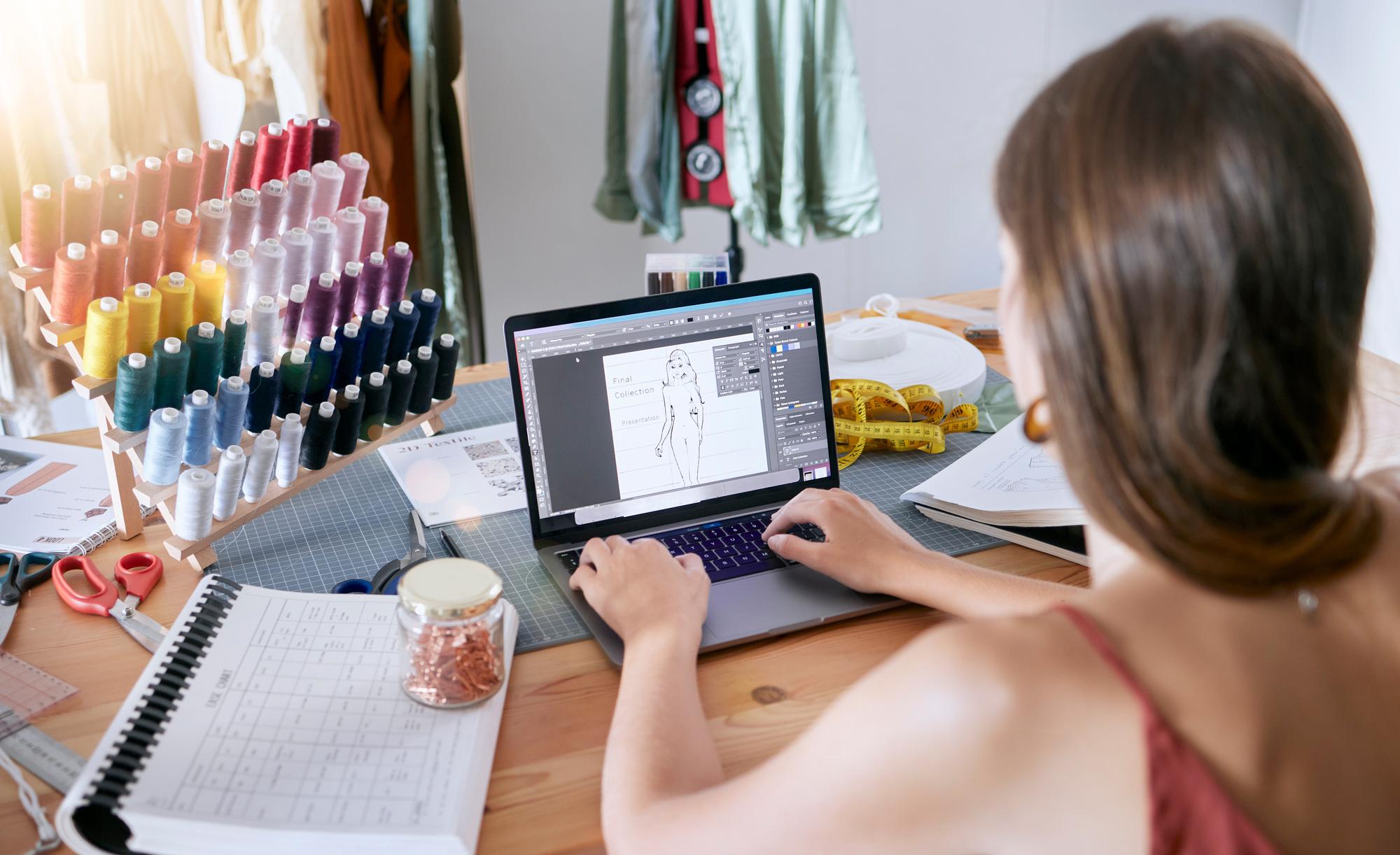 Workstation with embroidery software on laptop